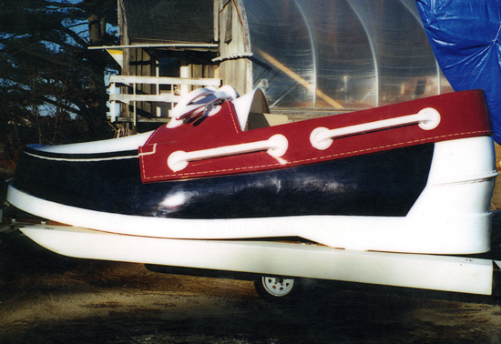 powerboat shaped like Sebago shoe